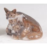 A Royal Copenhagen porcelain model of a Vixen Fox with cubs, printed backstamp, numbered 1788 and