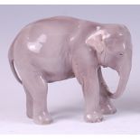 A Royal Copenhagen porcelain model of a standing elephant, printed backstamp, numbered 501 and