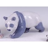 A Royal Copenhagen porcelain model of a Giant Panda bear walking, printed backstamp and numbered