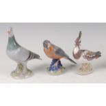 A Royal Copenhagen porcelain model of a Pigeon, printed backstamp and numbered 2933 verso, h.19cm;