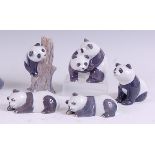 Five various Royal Copenhagen small porcelain models of Panda bears, each with printed backstamps