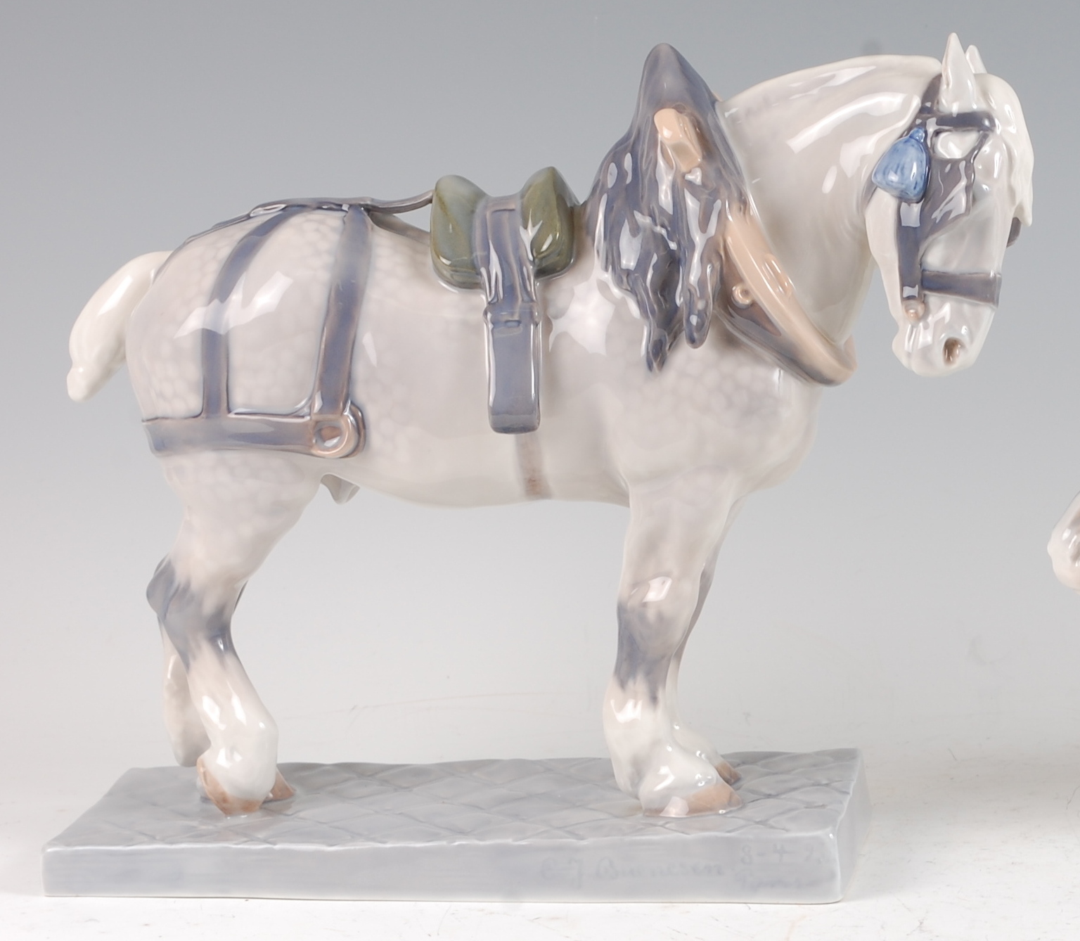 A Royal Copenhagen large porcelain model of a standing Percheron carthouse, raised on integral