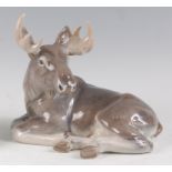 A Royal Copenhagen large porcelain model of an Elk, in recumbent pose, printed backstamp, numbered