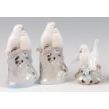 A pair of Royal Copenhagen porcelain model groups of Lovebirds, printed backstamps and numbered