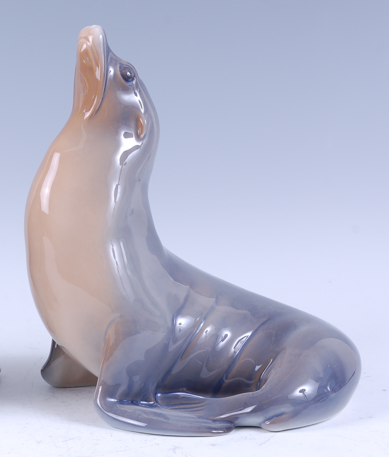 A Royal Copenhagen large porcelain model of a Sea-lion, designed by Theodore Madsen, printed