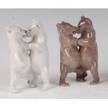 A Royal Copenhagen porcelain model of a pair of fighting Polar bears, numbered 24, h.13.5cm;