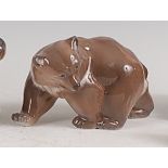 A Royal Copenhagen porcelain model of a Brown bear, in striding pose, printed backstamp and numbered