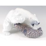 A Royal Copenhagen large porcelain model of a Polar Bear attacking a seal, printed backstamp,