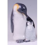 A Royal Copenhagen large porcelain model of a penguin with chick, printed backstamp, numbered 088