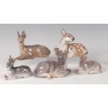 A Royal Copenhagen porcelain model of a recumbent Stag, printed backstamp and numbered 756 verso,