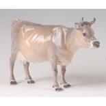 A Royal Copenhagen porcelain model of a standing Jersey Cow, printed backstamp and numbered 4678,