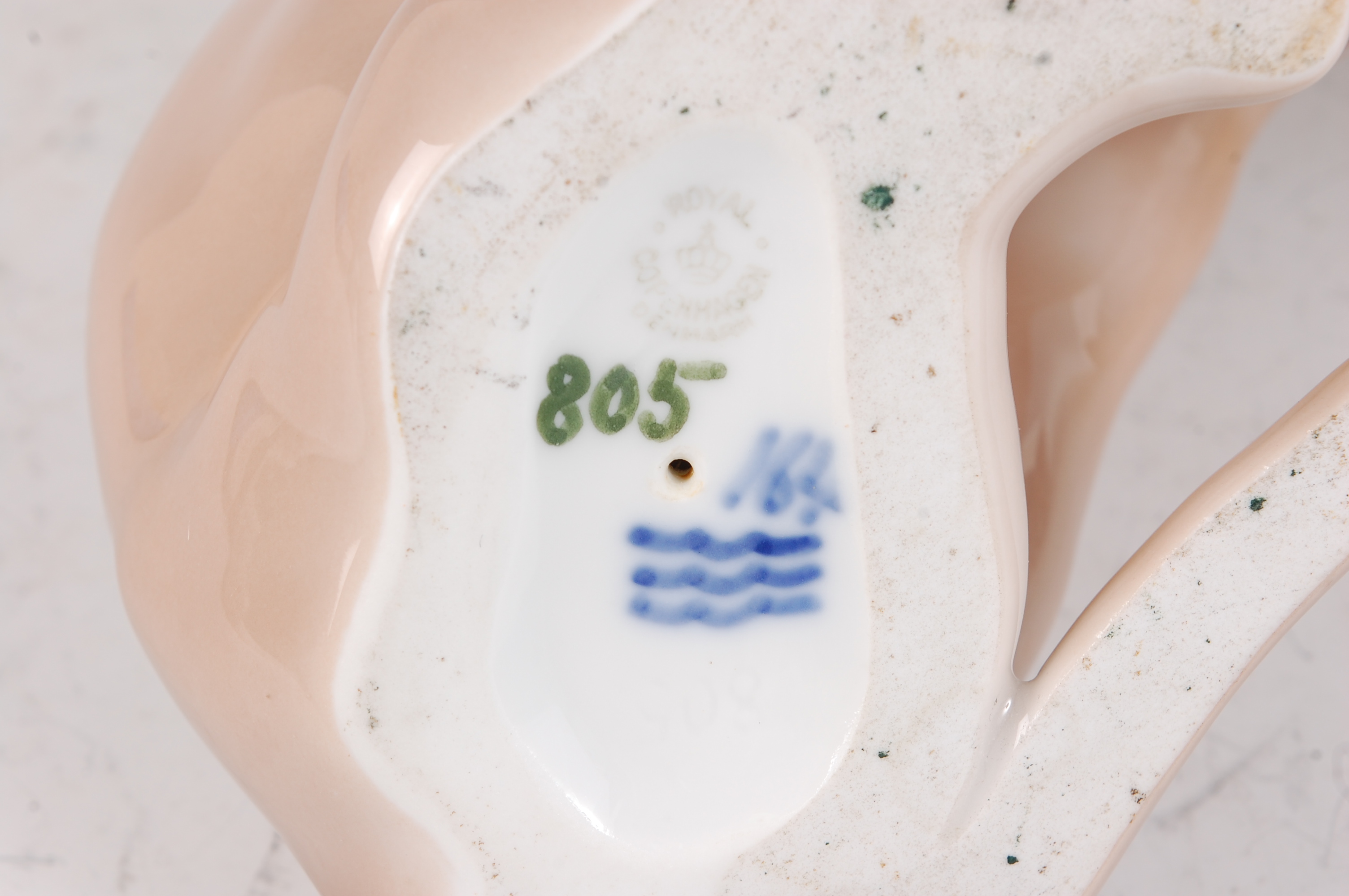 A Royal Copenhagen porcelain model of a young Leopardess, in seated pose washing her rear left - Image 2 of 2