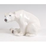 A Royal Copenhagen porcelain model of a Polar Bear, in seated pose, printed backstamp and numbered