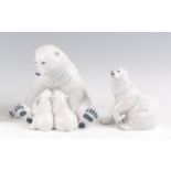 A Royal Copenhagen porcelain model of a Polar Bear and two cubs, printed backstamp, numbered 087 and