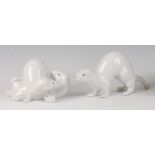 A Royal Copenhagen porcelain model of a pair of stoats, in playful pose, designed by Jeanne Grut,