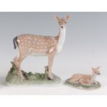 A Royal Copenhagen large porcelain model of a standing deer, printed backstamp, numbered 465 and