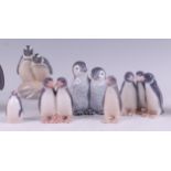 A collection of six various Royal Copenhagen small porcelain models of penguins, each with printed