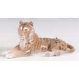 A Royal Copenhagen large porcelain model of a Tiger, in recumbent pose, printed backstamp and