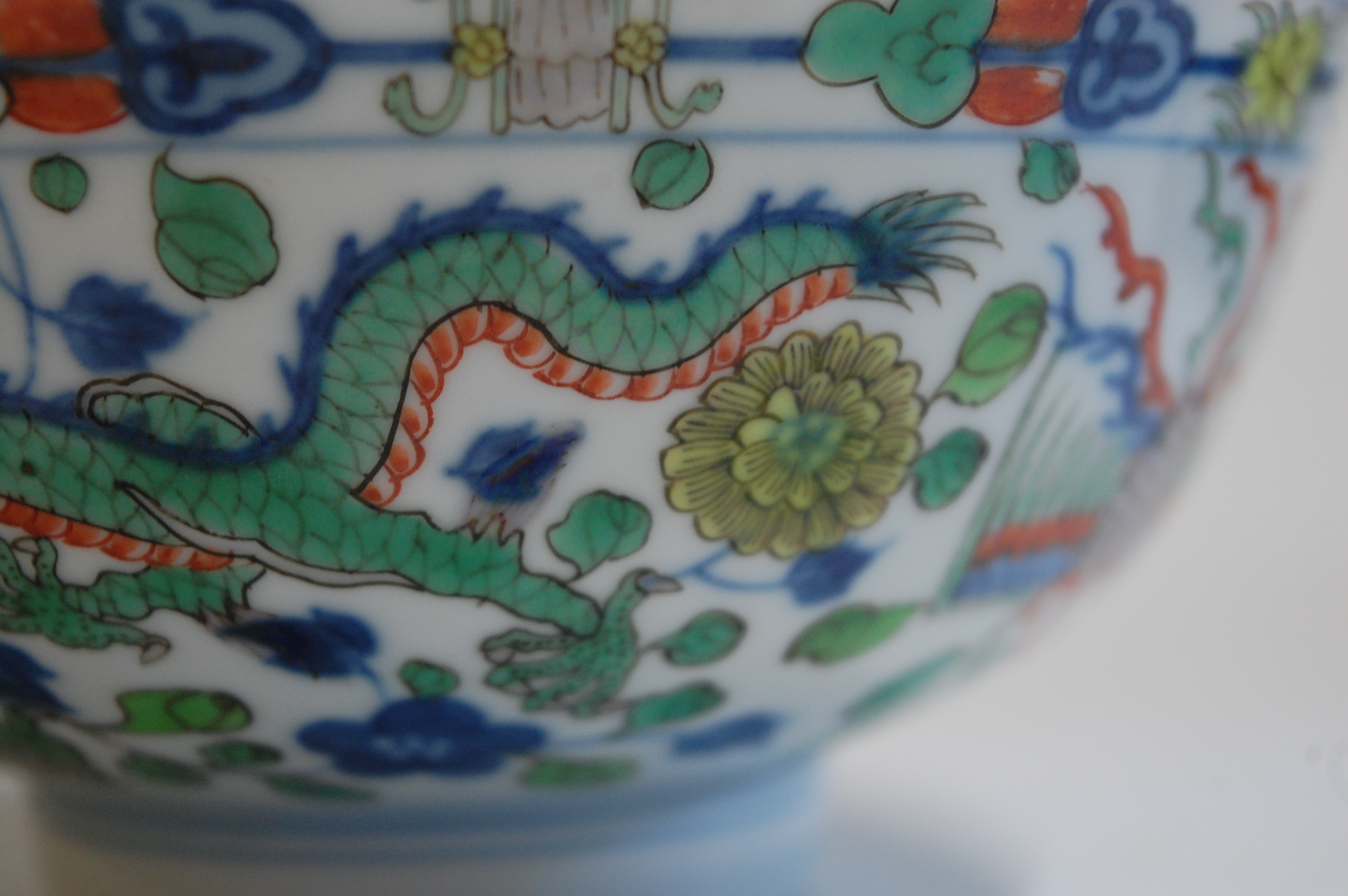 A Chinese porcelain bowl , the interior blue and white decorated with flowering rockwork and - Image 16 of 37