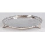 A George III silver salver, having a gadrooned raised rim within leaf and flower engraved band, 13.