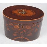 A George III fiddleback mahogany and floral marquetry inlaid tea caddy, of oval form, the hinged lid