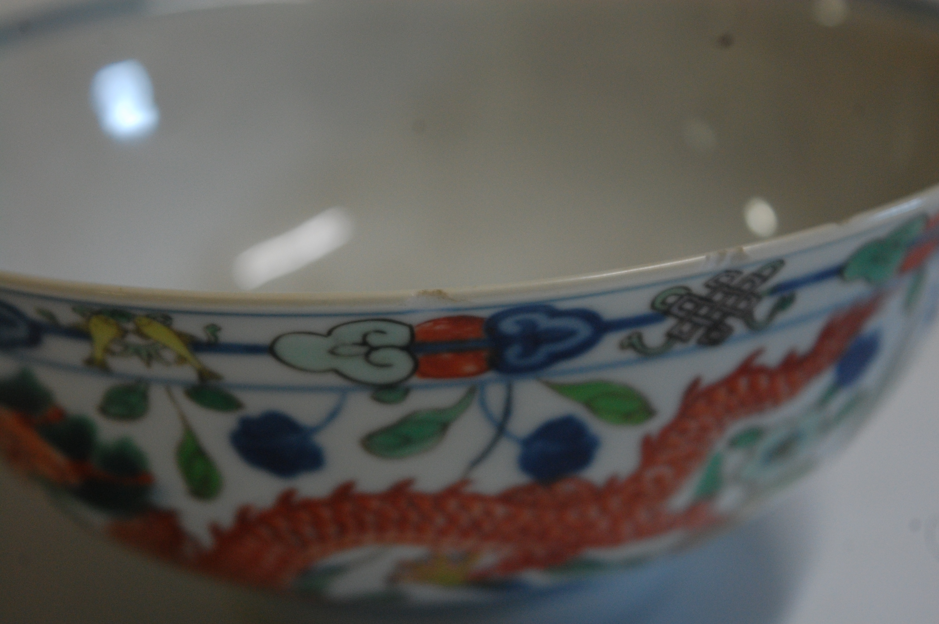 A Chinese porcelain bowl , the interior blue and white decorated with flowering rockwork and - Image 10 of 37