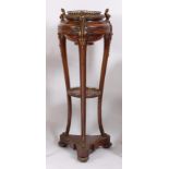 A Victorian figured walnut marquetry inlaid and gilt metal mounted jardiniere, of circular