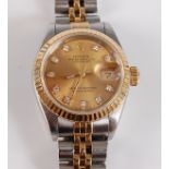 An Oyster steel and yellow lady's Rolex Datejust 26 wristwatch, having a champagne diamond dial with