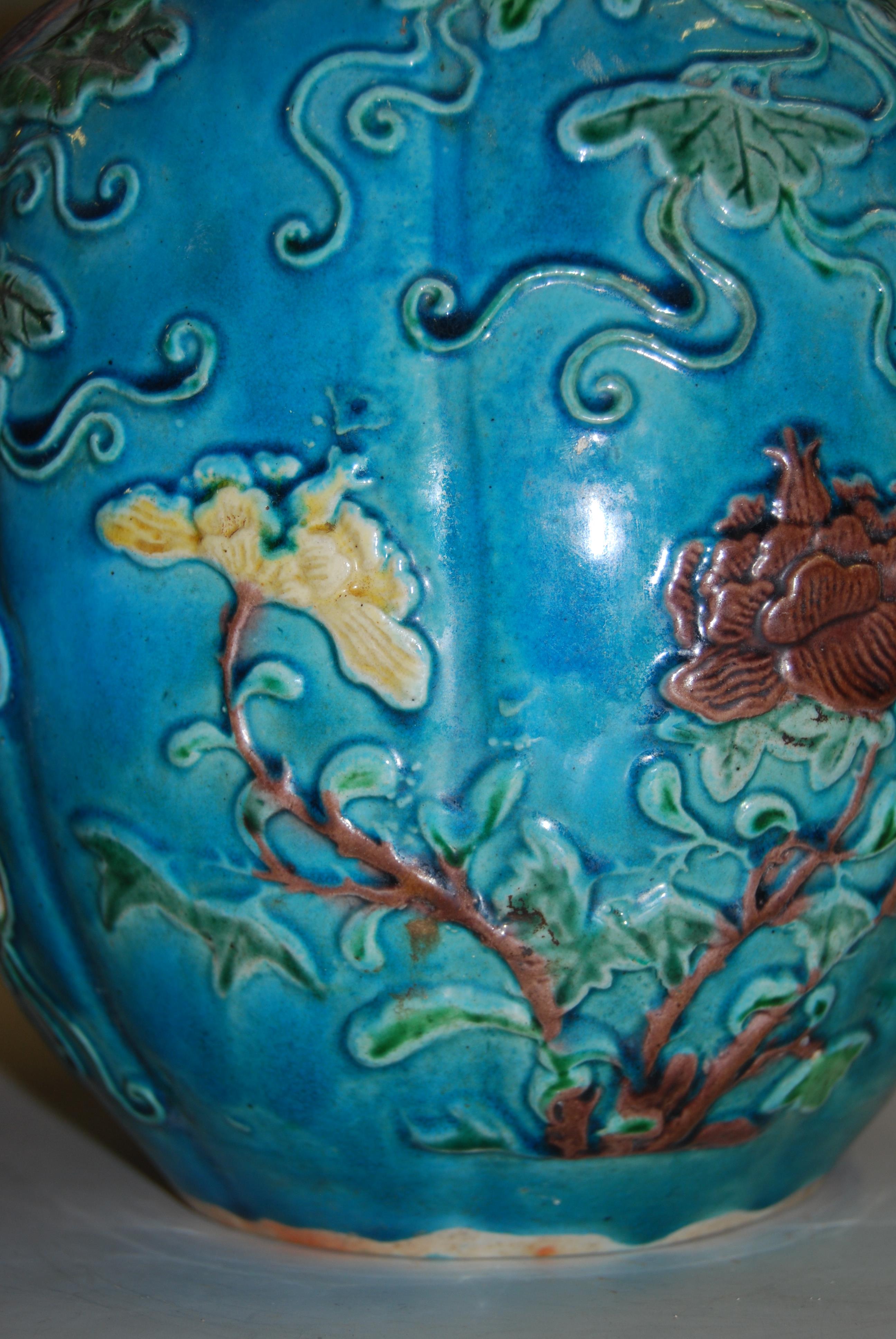 A 19th century Chinese ginger jar and cover, the turquoise ground applied with trailing flowers, - Image 12 of 19