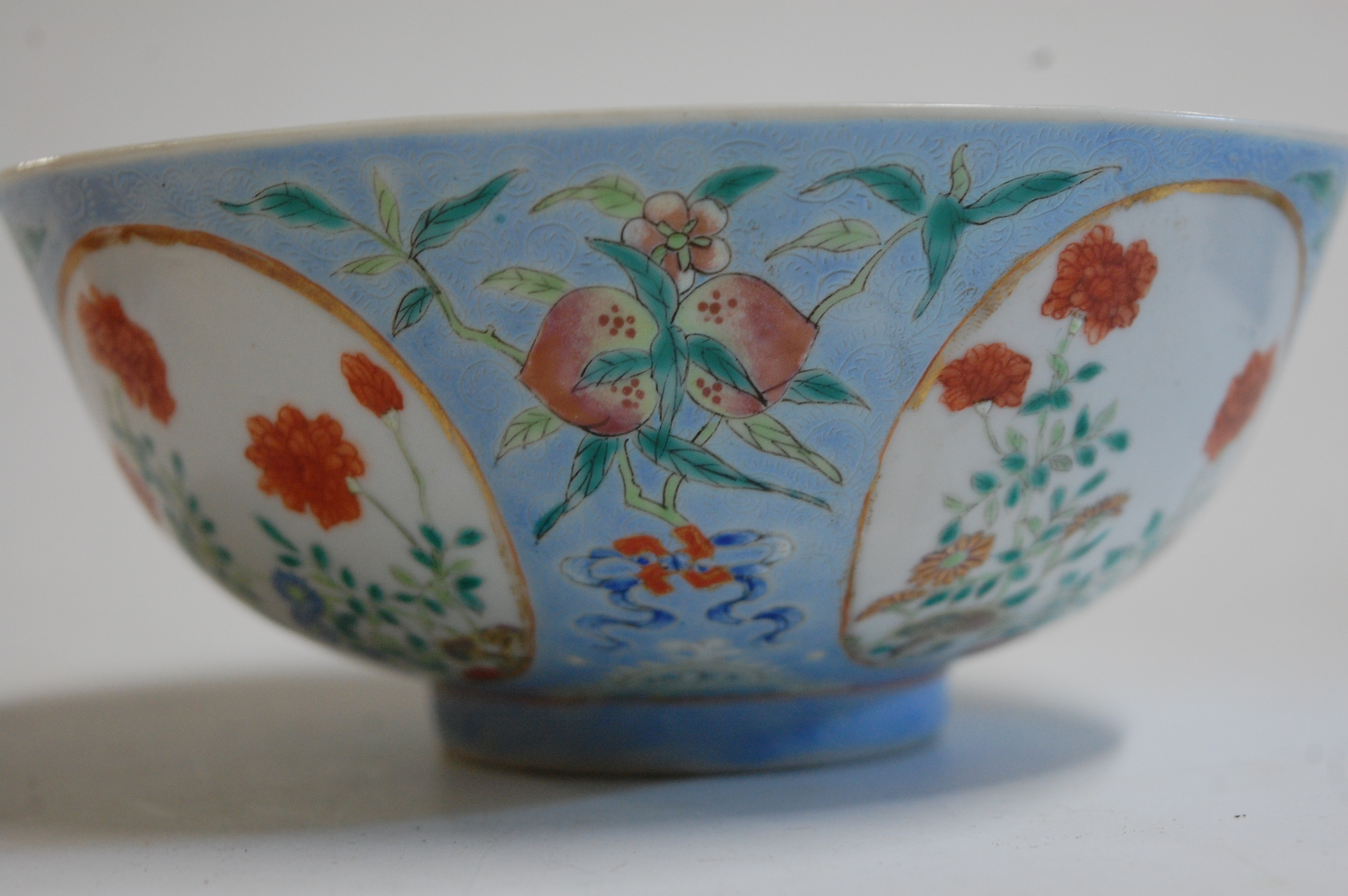 A Chinese porcelain bowl , the interior blue and white decorated with flowering rockwork and - Image 23 of 37