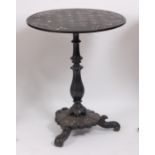 A Victorian black lacquered and mother of pearl inlaid pedestal occasional table, having circular