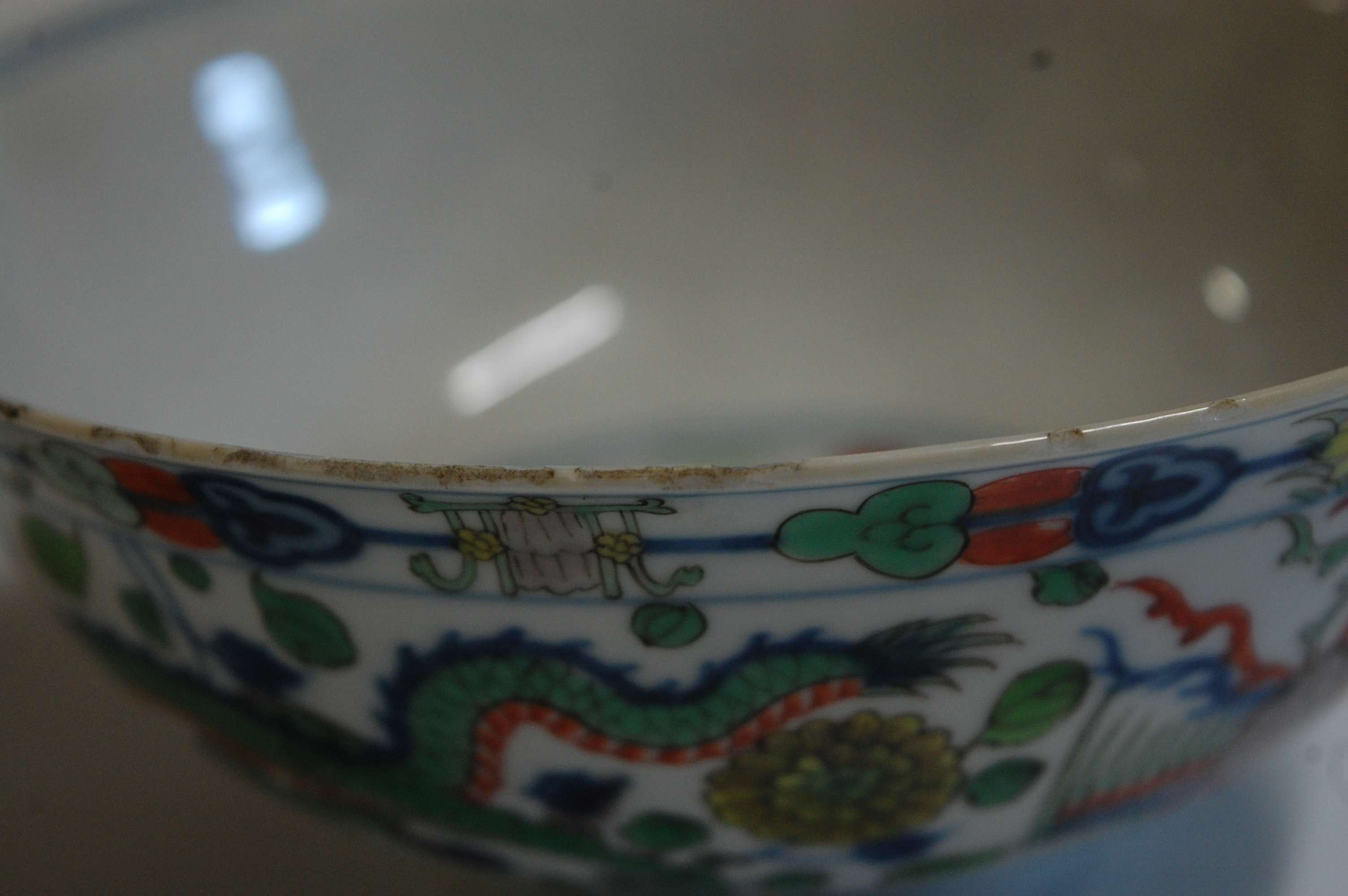 A Chinese porcelain bowl , the interior blue and white decorated with flowering rockwork and - Image 8 of 37