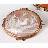 A Victorian carved shell cameo brooch depicting Phoebus Apollo on his chariot with Aurora leading