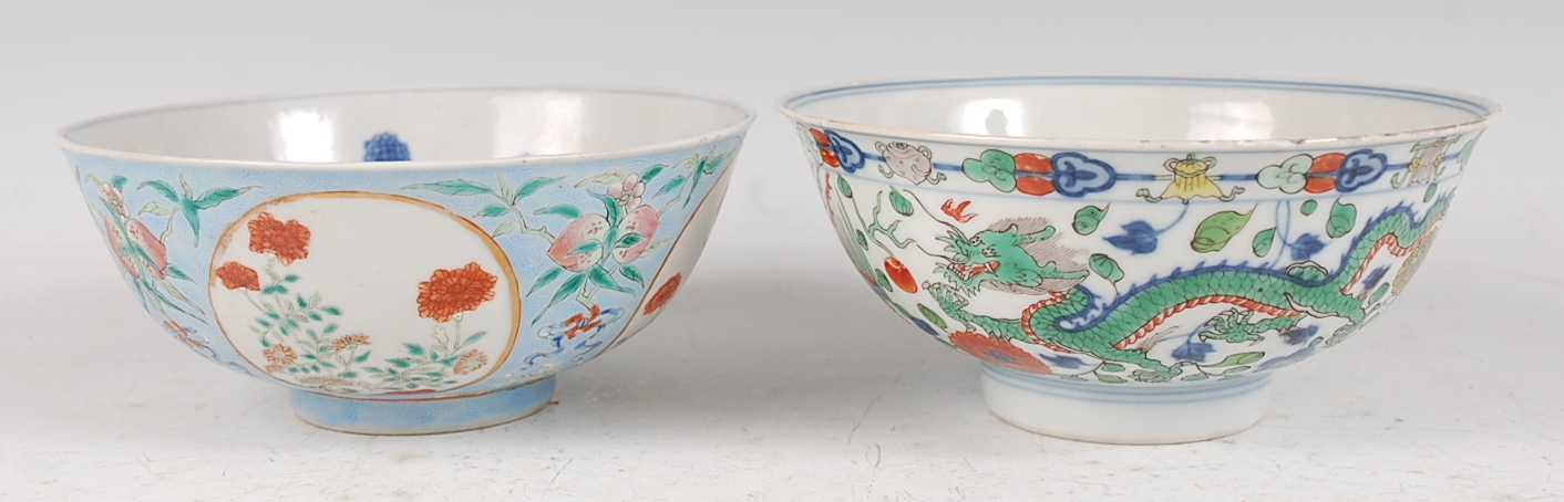 A Chinese porcelain bowl , the interior blue and white decorated with flowering rockwork and - Image 3 of 37