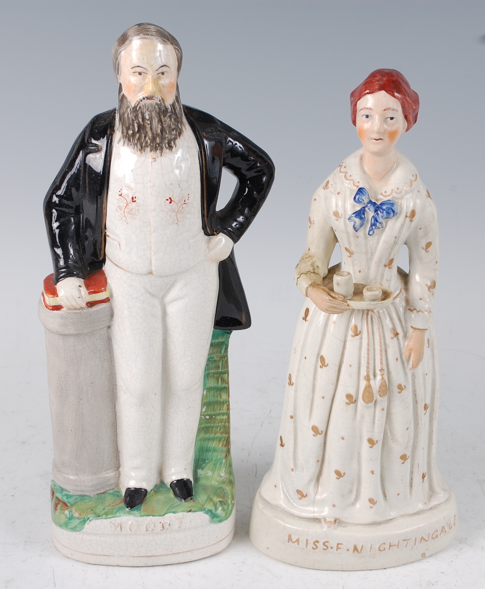 A Victorian Staffordshire flatback figure of American Evangelist Dwight L Moody, in standing pose,