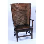 A 19th century stained pine Orkney chair, having a bowed rush back and plain seat, w.59cm, h.104cm