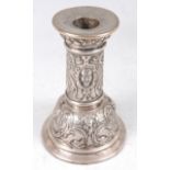 A late 19th century continental silver table candlestick, probably French, the sconce with a