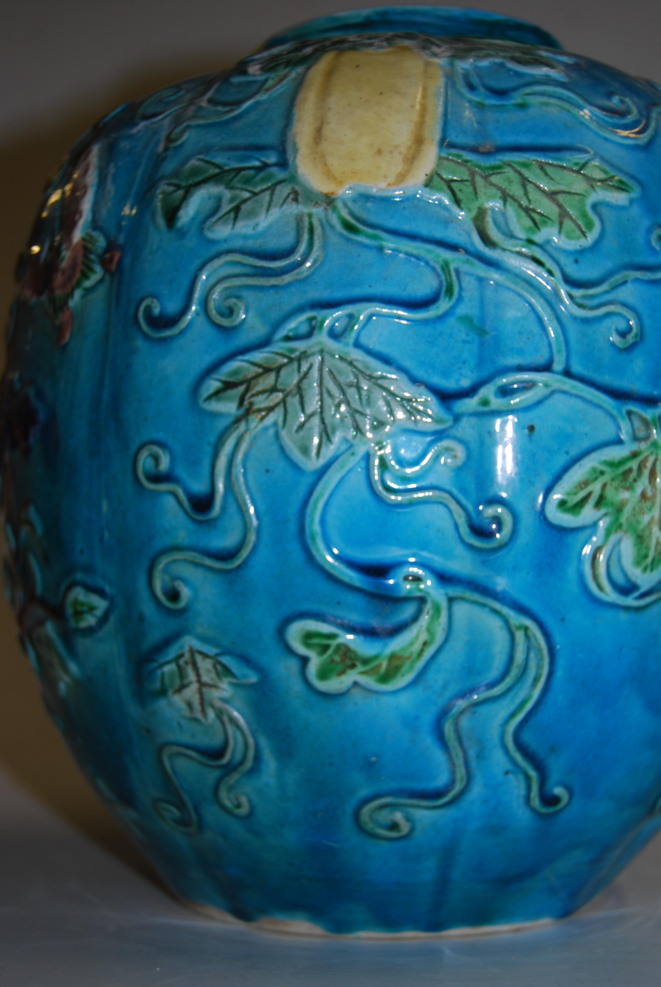 A 19th century Chinese ginger jar and cover, the turquoise ground applied with trailing flowers, - Image 14 of 19