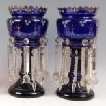 A pair of Victorian Bristol blue glass pedestal lustres, each with traces of gilt and enamel