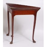 A George II walnut corner writing table, the fold-over top having pinched corner and opening to