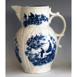 A Caughley cabbage leaf mask jug, circa 1775-90, printed in blue with the Fisherman & Cormorant