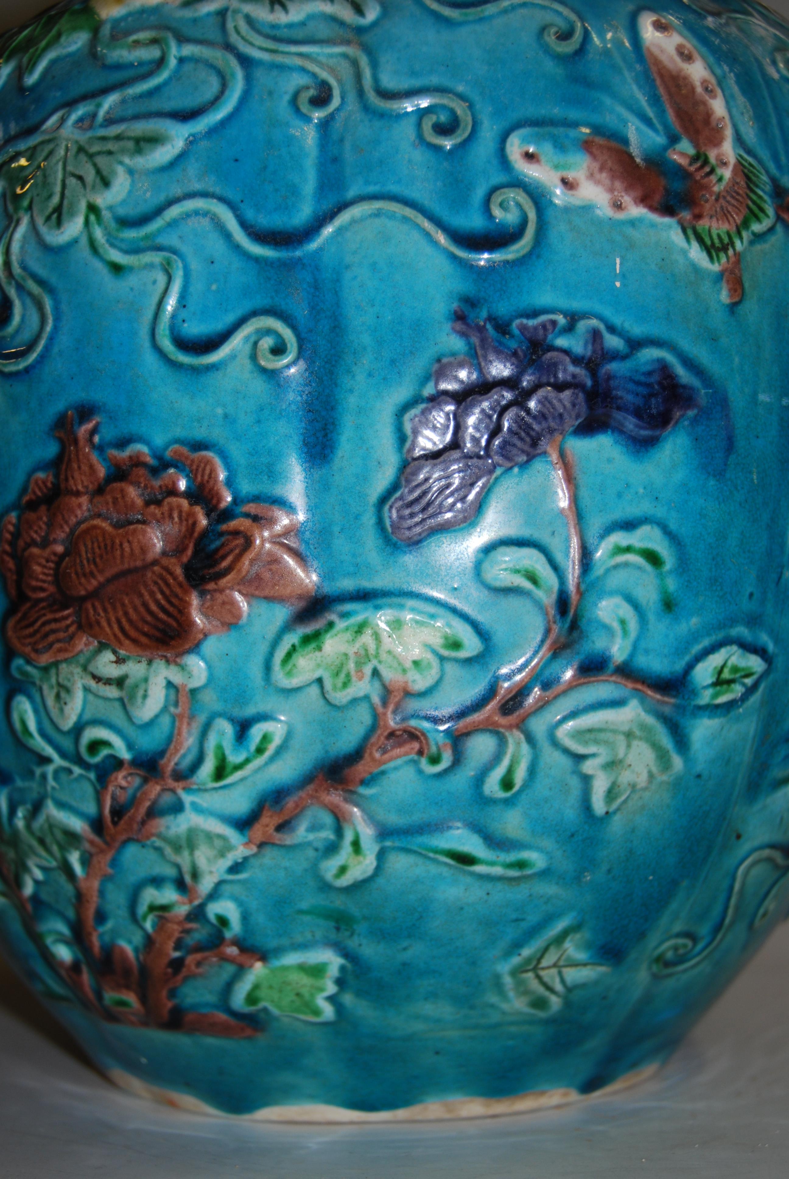 A 19th century Chinese ginger jar and cover, the turquoise ground applied with trailing flowers, - Image 13 of 19