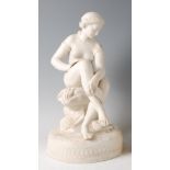 A Victorian parian figure group modelled as a nude maiden seated at a rocky outcrop, raised on a