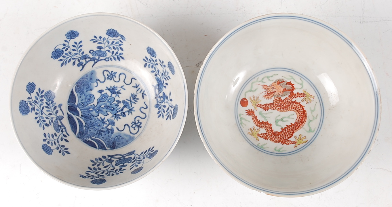 A Chinese porcelain bowl , the interior blue and white decorated with flowering rockwork and - Image 4 of 37