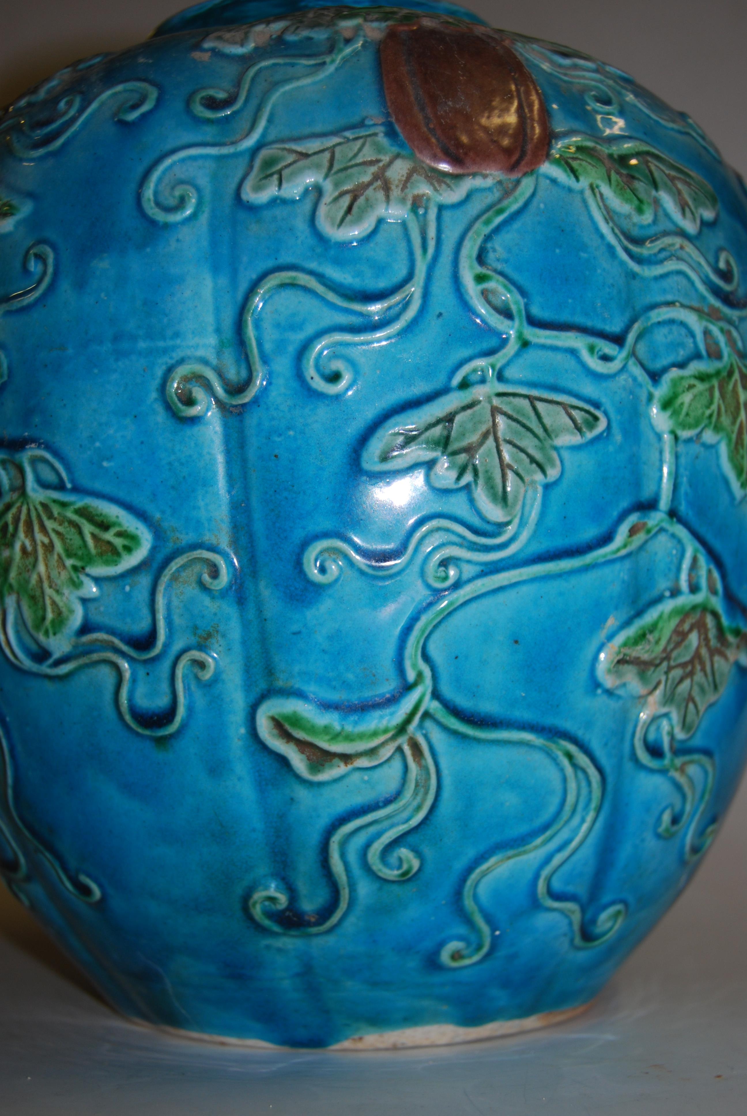 A 19th century Chinese ginger jar and cover, the turquoise ground applied with trailing flowers, - Image 15 of 19