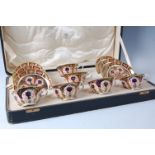 A cased set of six Royal Crown Derby teacups and saucers, decorated in the Imari palette and