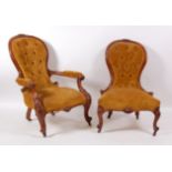 A pair of Victorian walnut showframe lady's and gent's spoonback parlour chairs, each having a