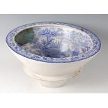 A Victorian blue and white transfer printed toilet bowl, the interior decorated with a fine