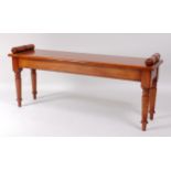 A mahogany and oak window seat, having turned ends, w.120cm, d.32cm, seat h.47cm