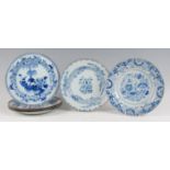 A set of four Chinese export porcelain blue and white plates, each decorated with chrysanthemums and